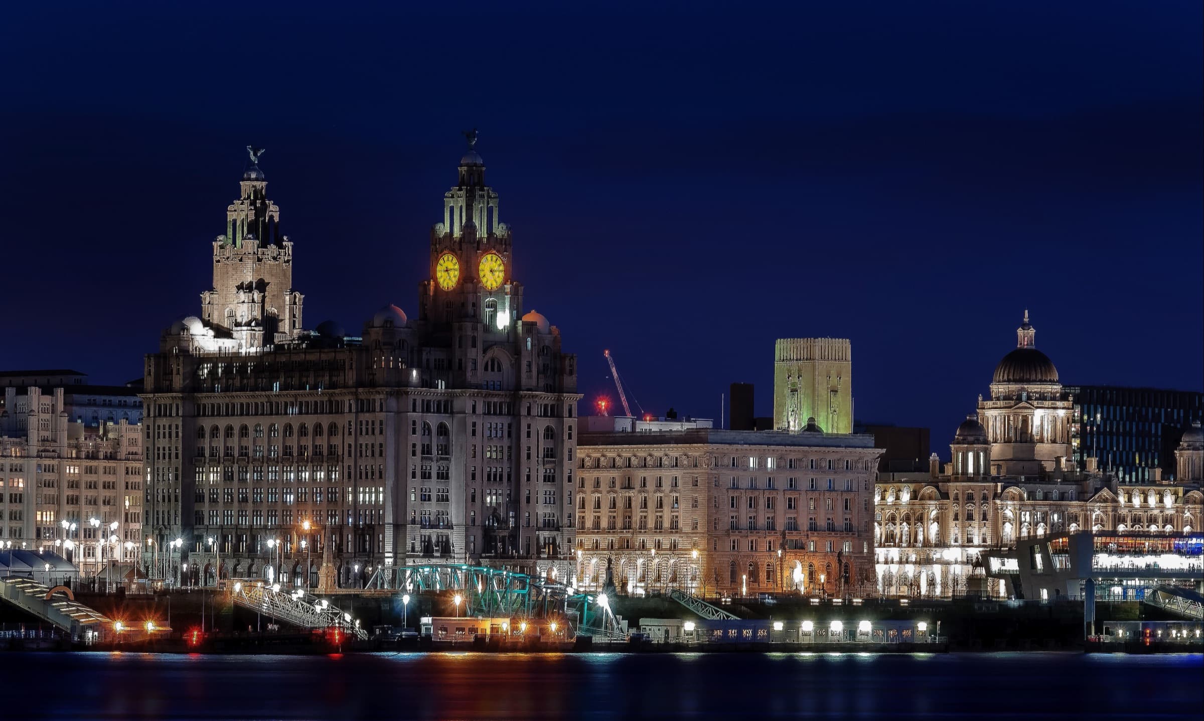 Liverpool waterfront at night with the Royal Liver Building