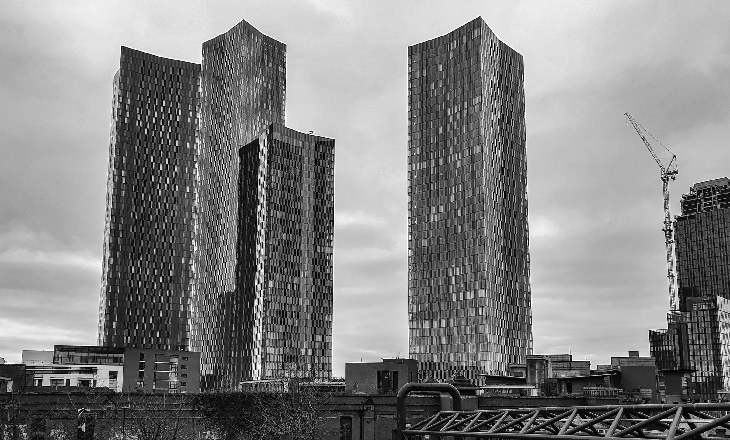 The four towers of Deansgate Square rising over Manchester city centre